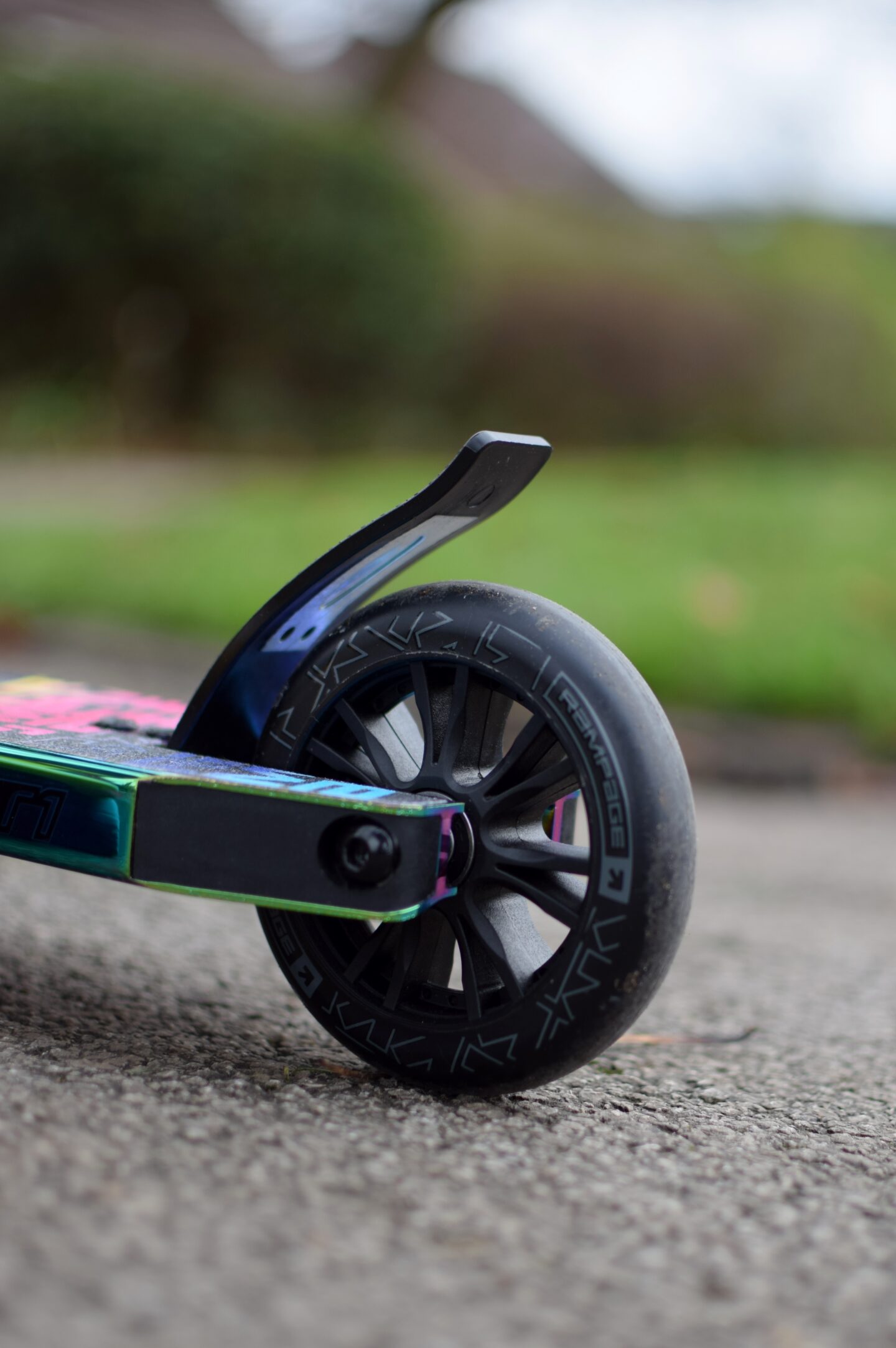 close up of stunt scooter brake