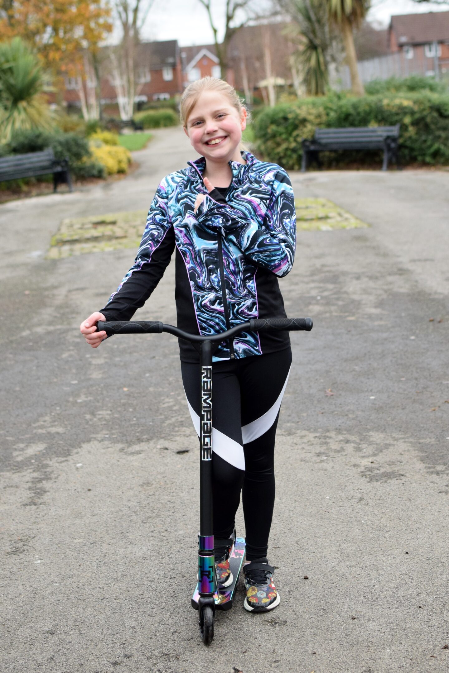 Amy giving her new Rampage R1 scooter the thumbs up
