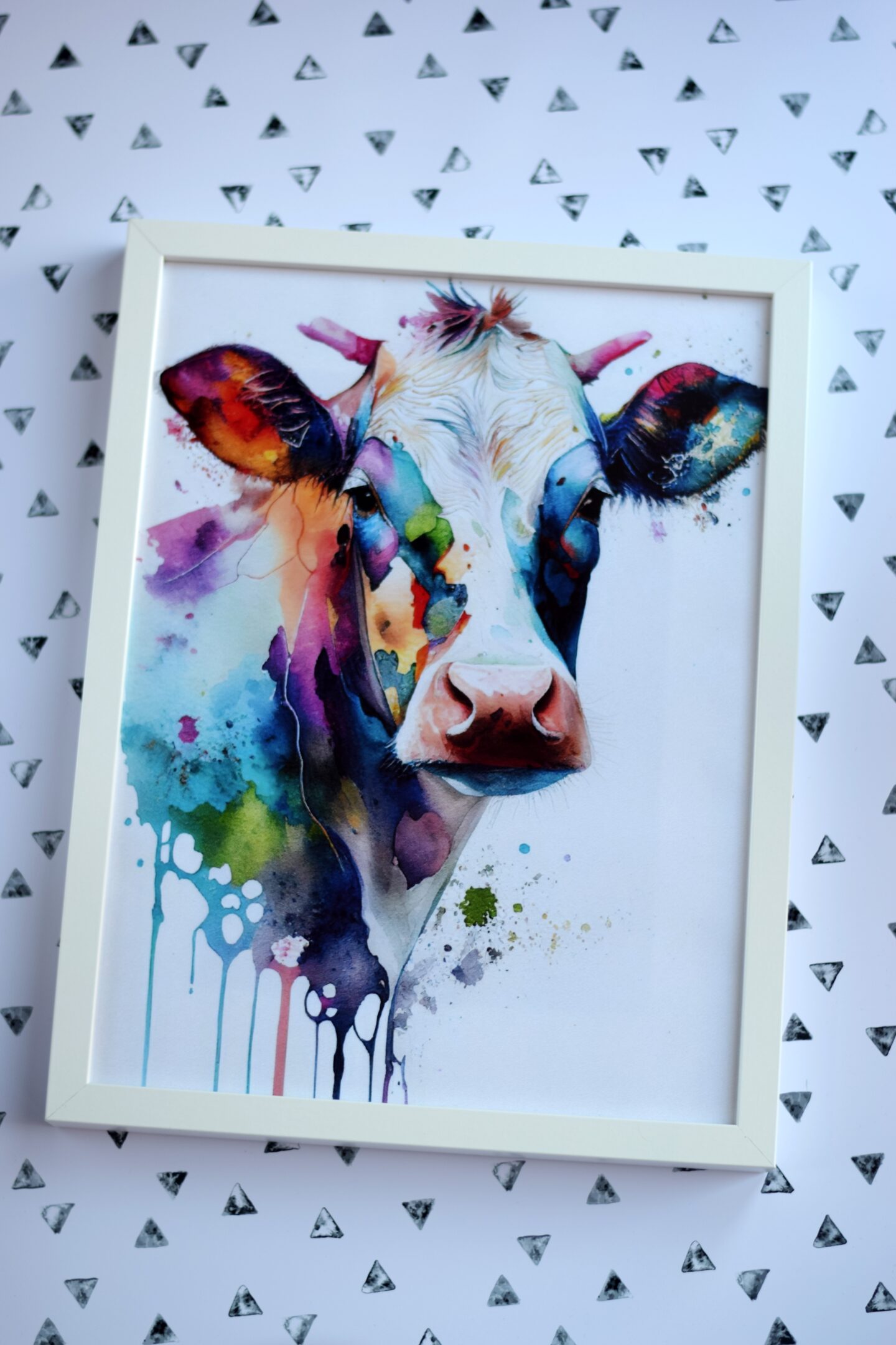 Framed poster print of a watercolour cow