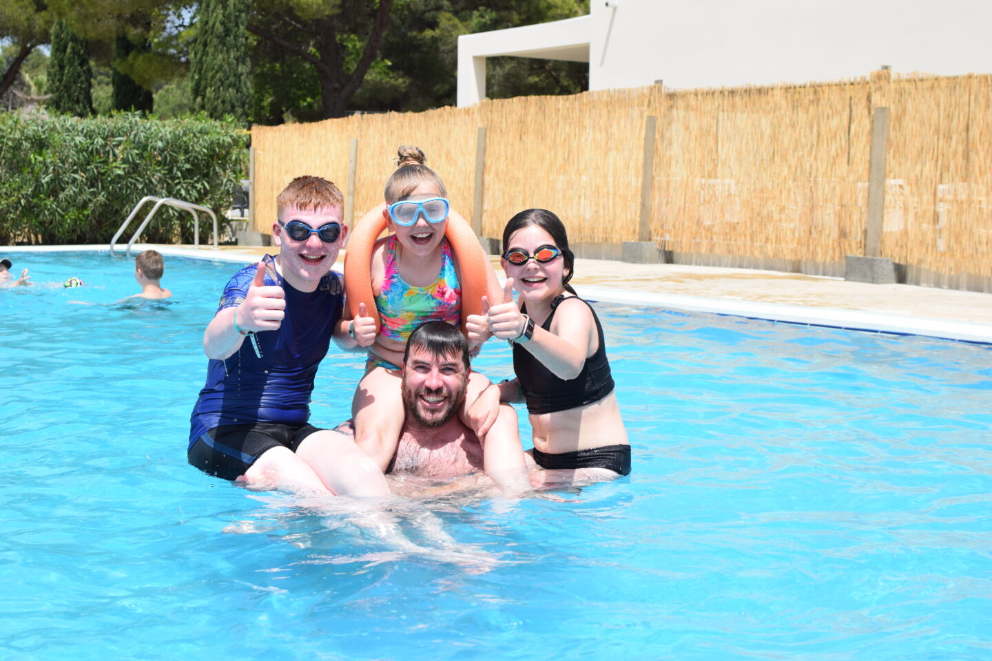 Camping Les Tropiques - kids in the pool with Uncle Chris