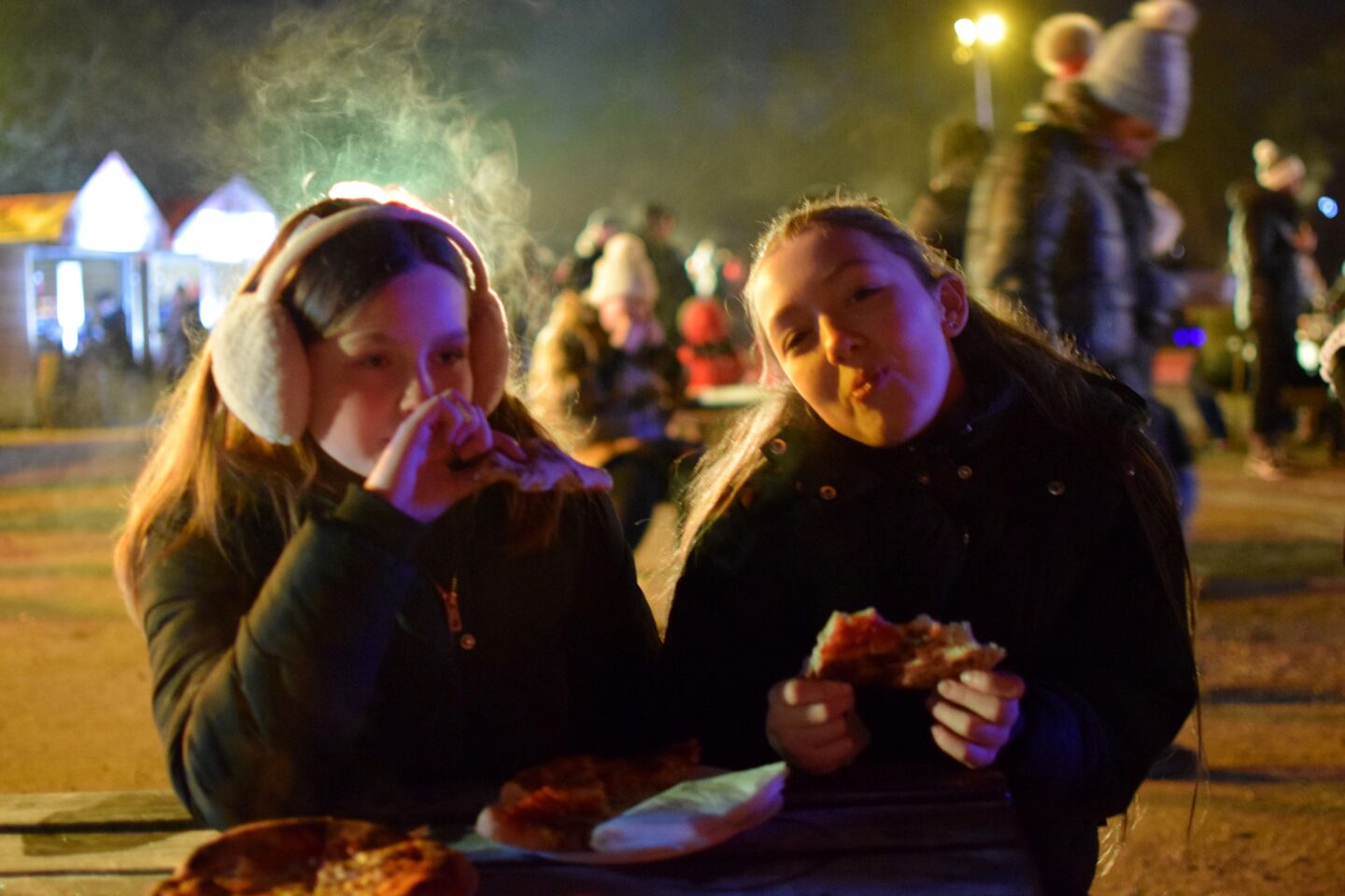Christmas at Heaton Park - girls eating pizza