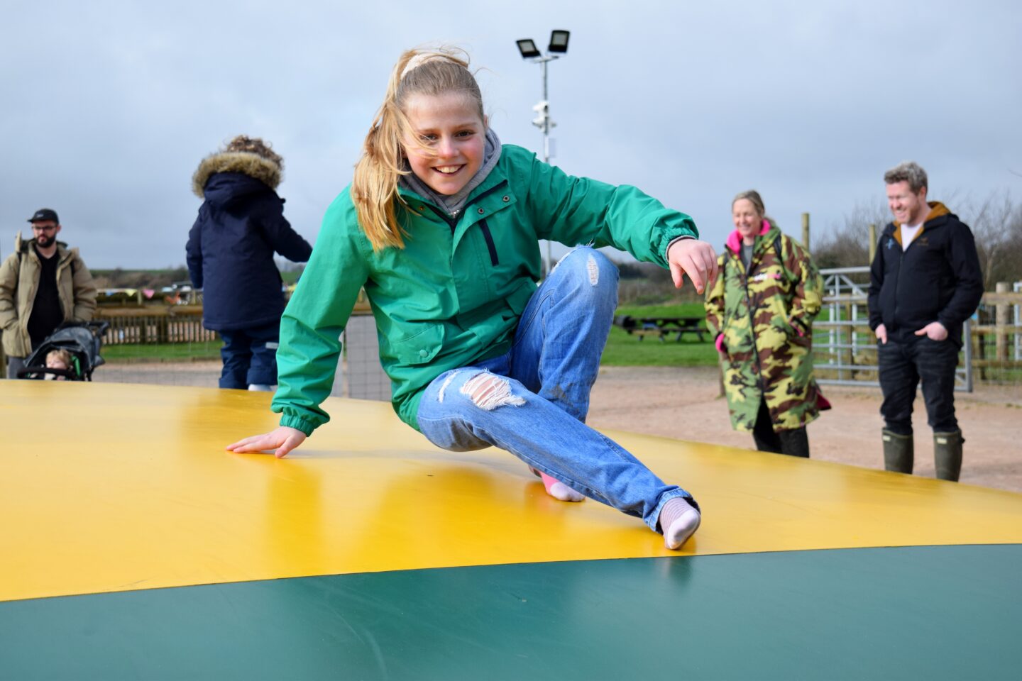 Amy on the bouncing pillow at Cockfields Farm