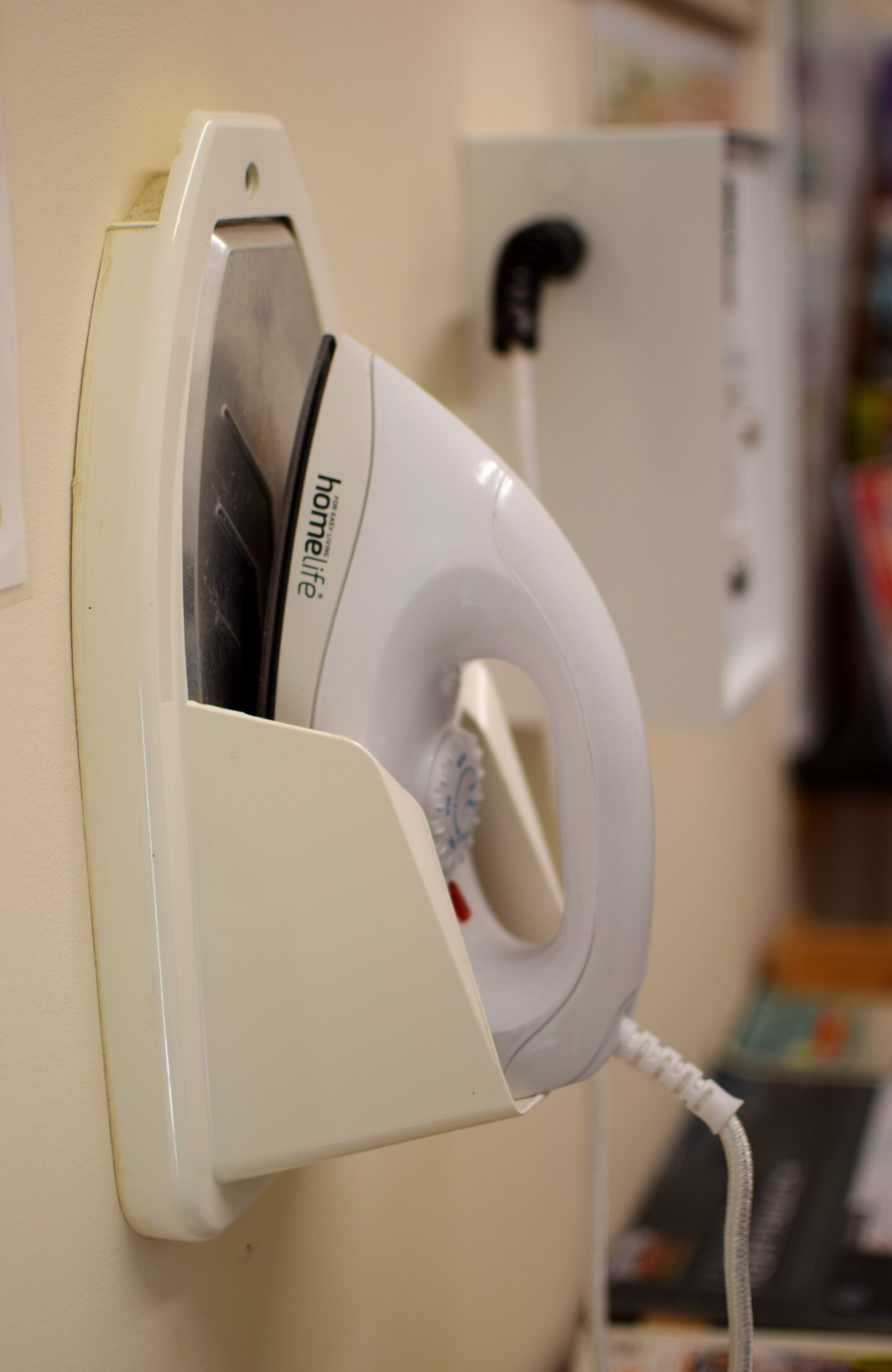 Iron on the wall in the laundry room - 20p to use