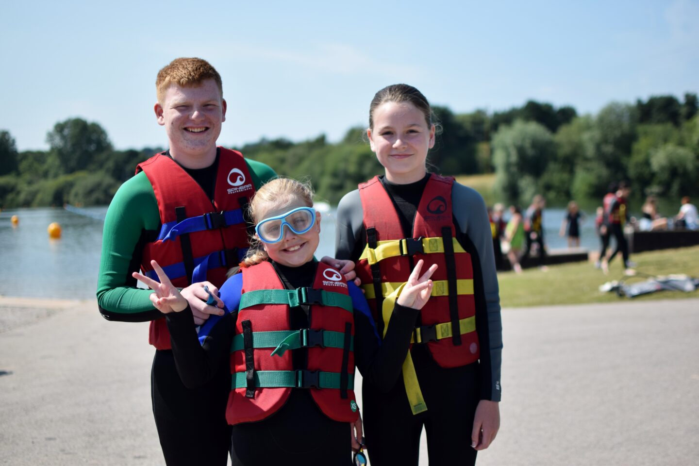 Kids in wetsuits at Wild Shore