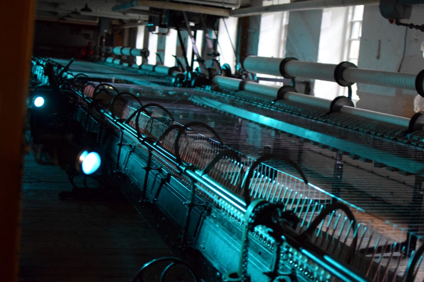 Lit machinery in Quarry Bank Mill for Halloween