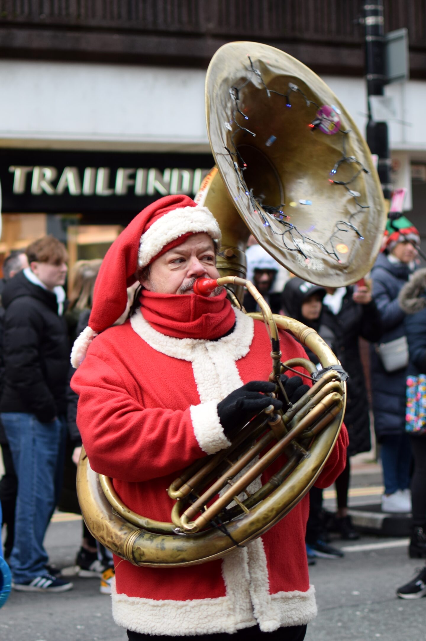 Manchester Christmas Parade - man playing the sousaphone