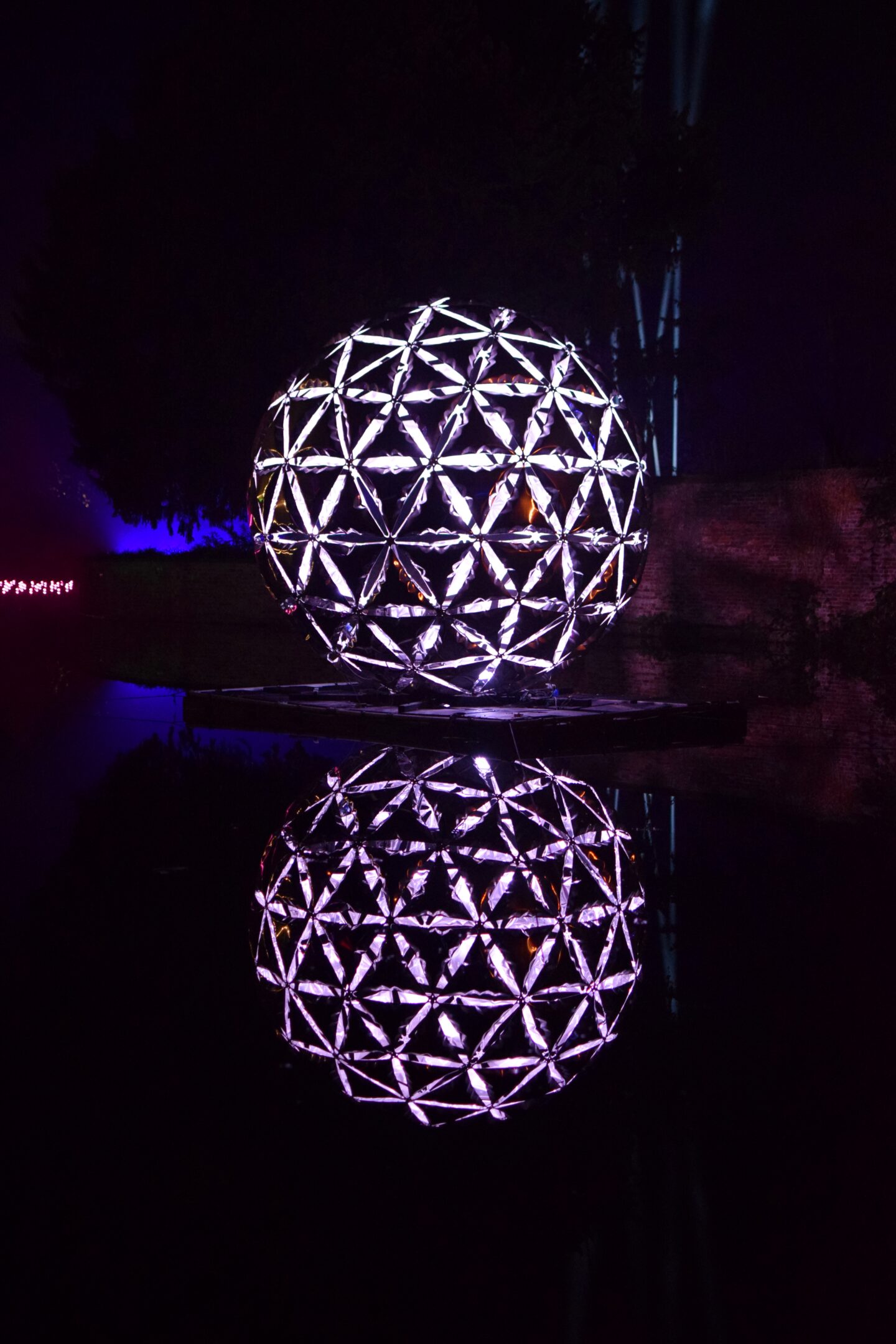 Light installations on the lake at Dunham Massey