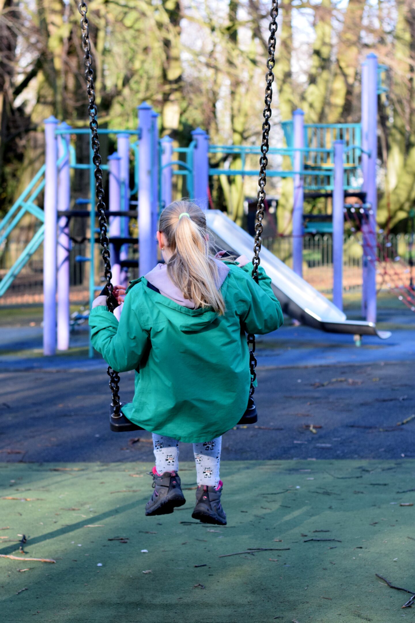 Amy on a swing in Alexandra Park, Whalley Range