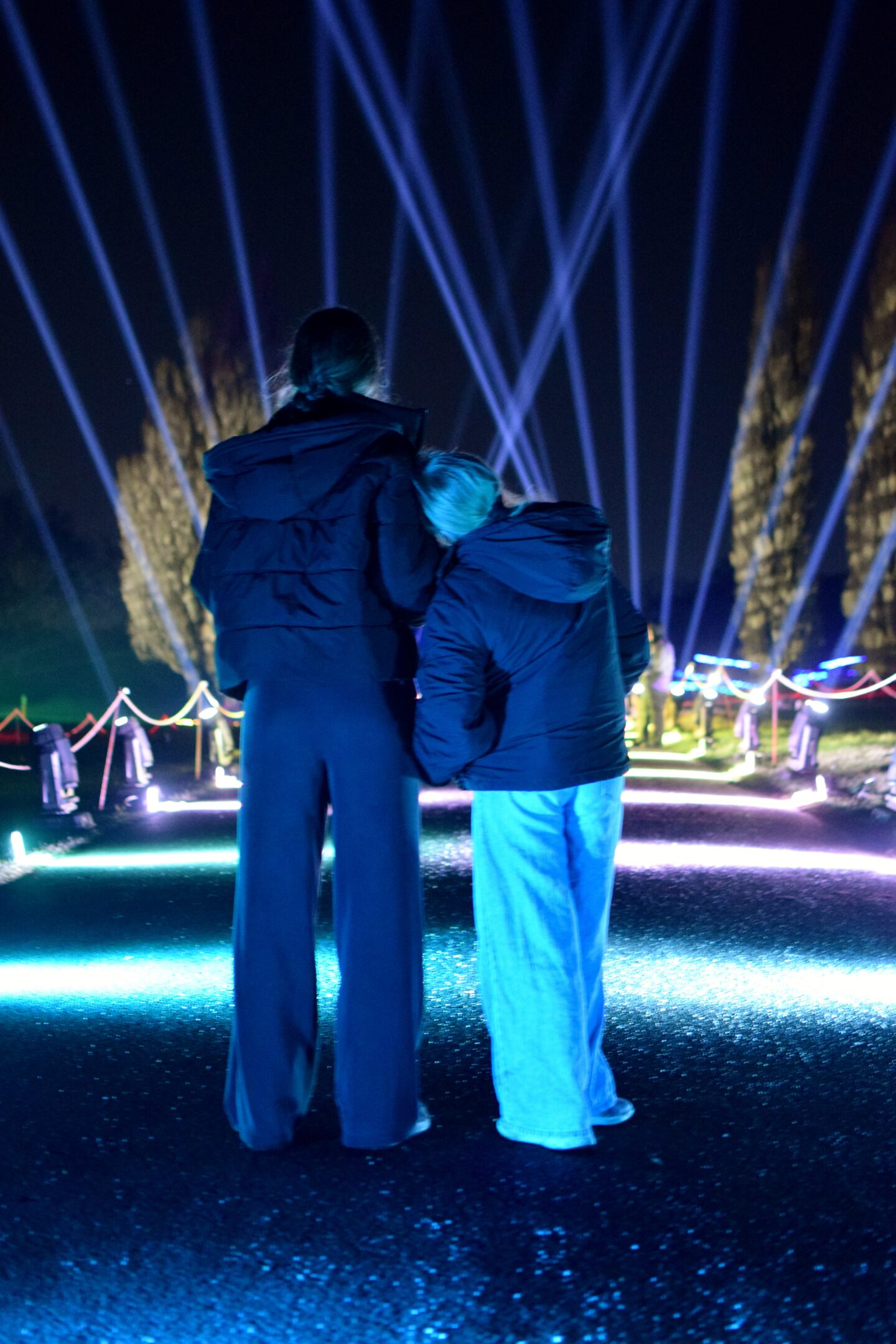 Chloe and Amy watching the lasers Northern Lights Manchester