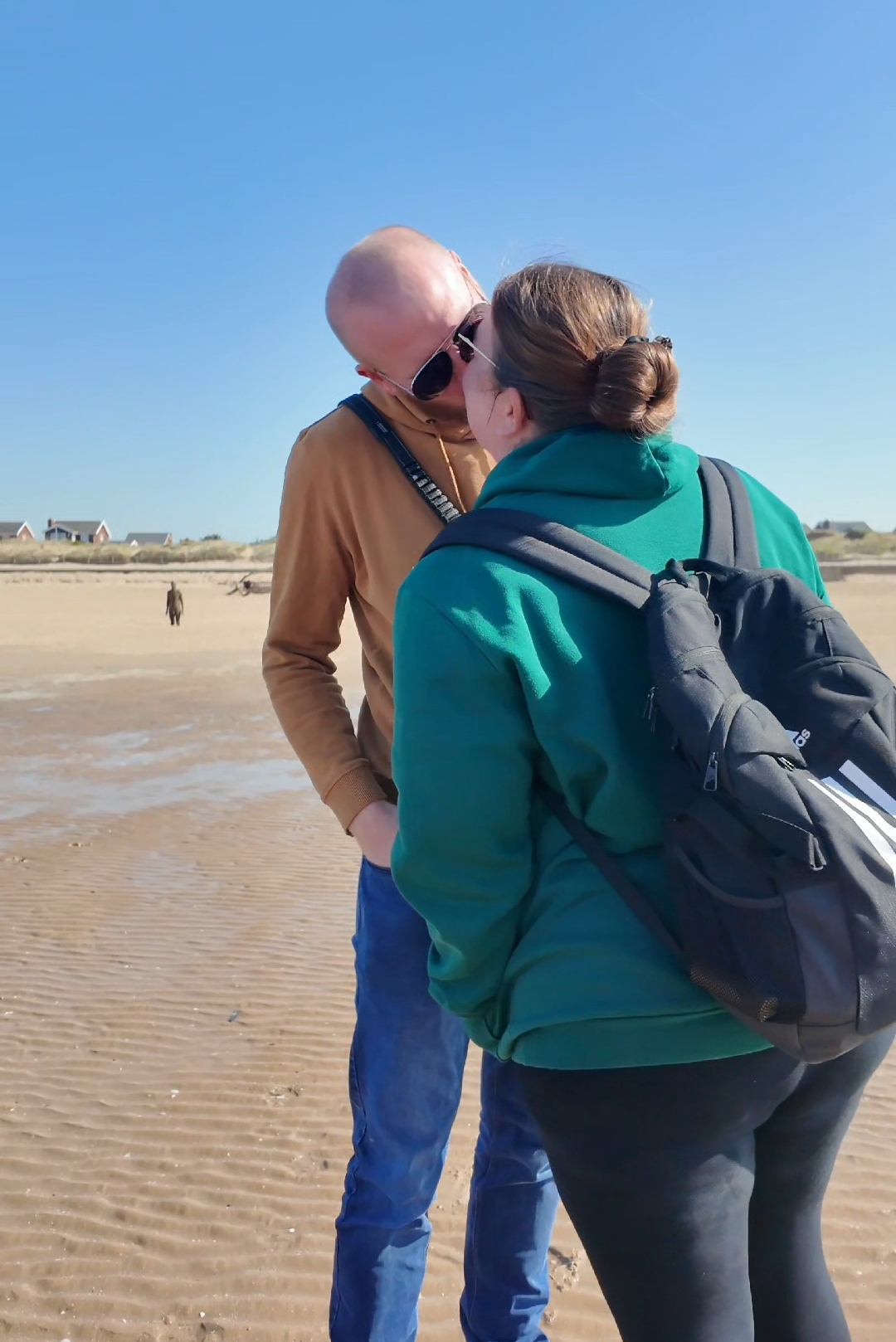 Colette and Dave Colette and Dave on the beach sharing a kiss